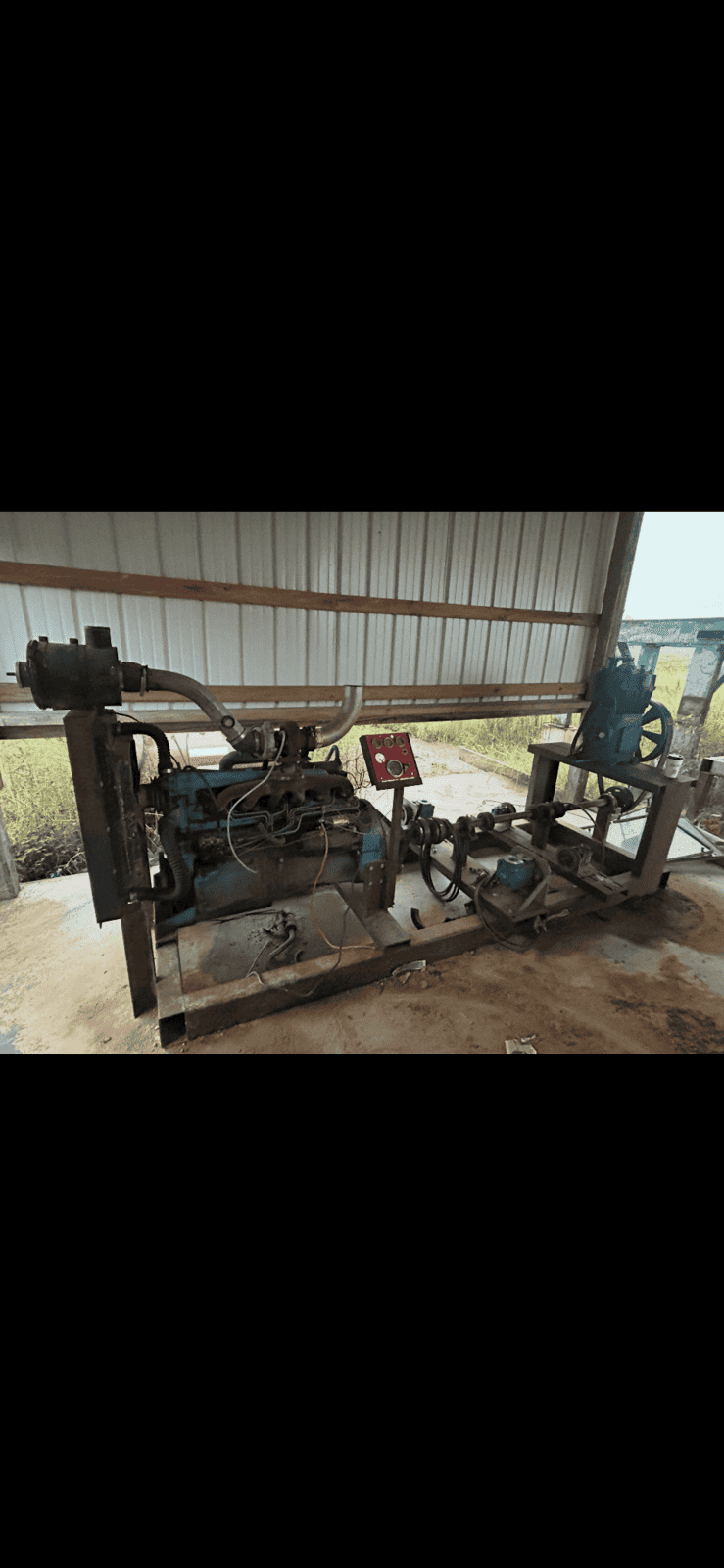 image0 (1) Heavy-duty Sharp Chain Scragg Mill with hydraulic controls and conveyor system.