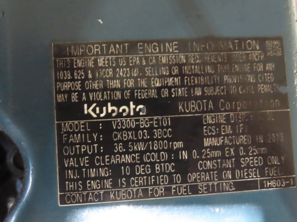 2013 Kubota V3300-BG-ET01 Power Unit Close-up of engine data plate on Kubota V3300-BG-ET01 power unit showing model, family, output, and specs.