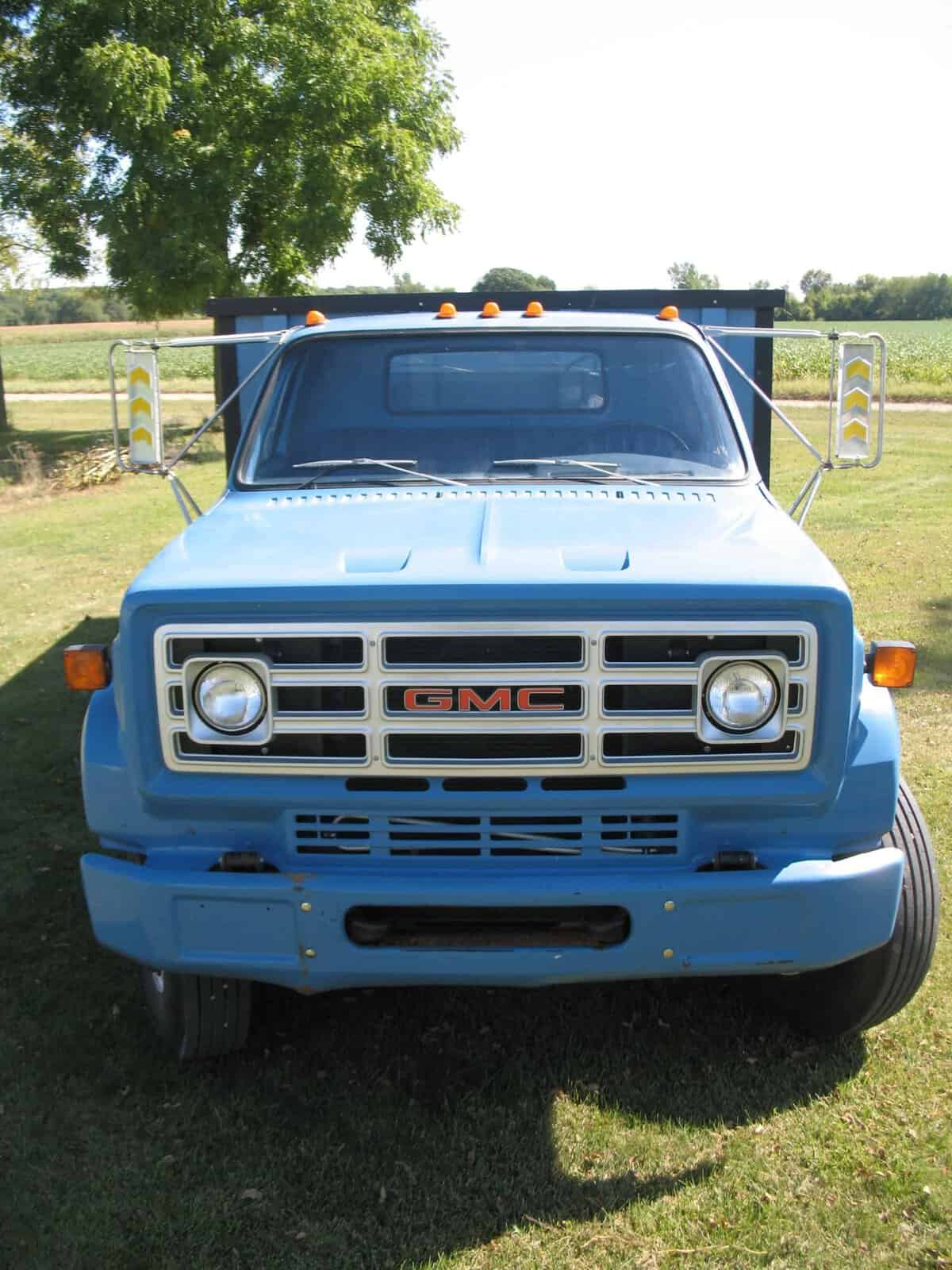 1985 GMC C7000 Grain Truck front view 1985 GMC C7000 grain truck front grille and headlights.