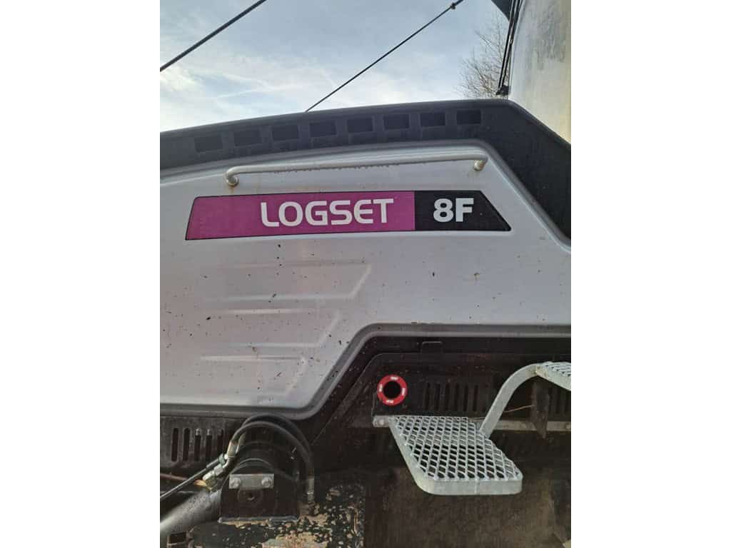 RAW_Logset 9 Logset 8F forwarder engine with purple logo and metal steps for access.