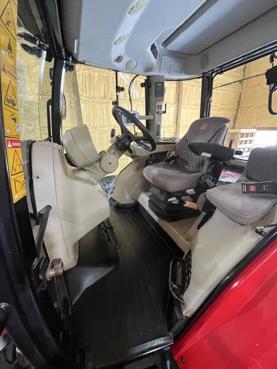 2012 Massey Ferguson 7624 Cab Interior Cab interior of 2012 Massey Ferguson 7624 tractor with steering wheel and seat.