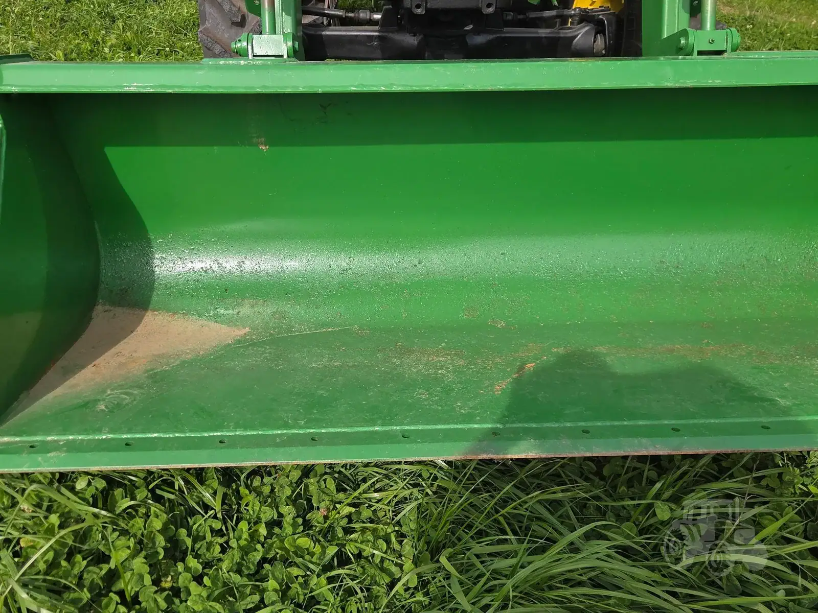 img (14) Green John Deere 5101E tractor front loader bucket with visible wear.