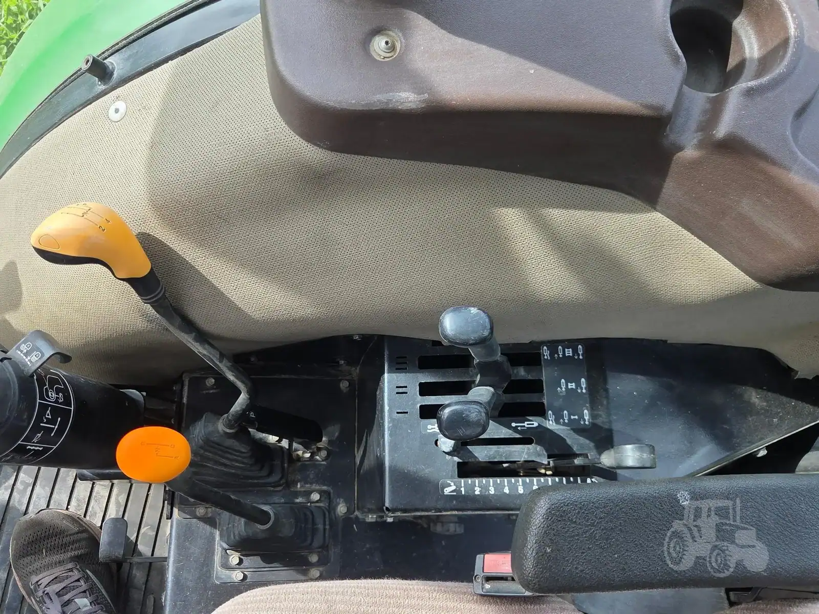 img (19) Close-up of tractor controls and dashboard in a 2010 John Deere 5101E.