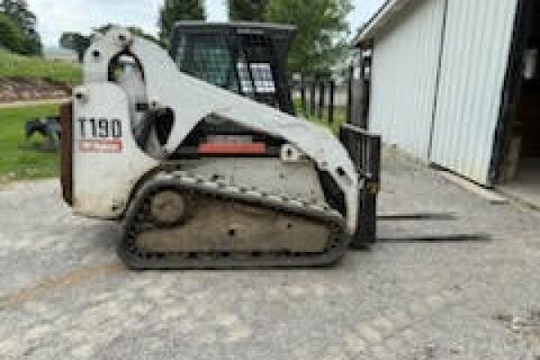 2019 Bobcat T590 compact track loader with enclosed cab and rubber tracks.