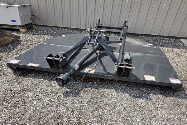 7-foot rotary cutter brush hog with heavy-duty blades and adjustable hitch.