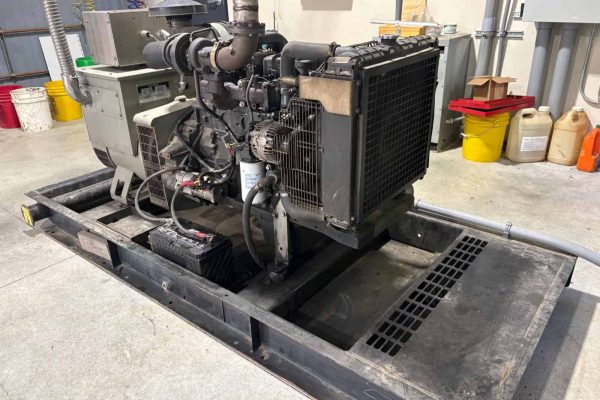 Industrial 60 kW diesel generator with radiator and control panel.