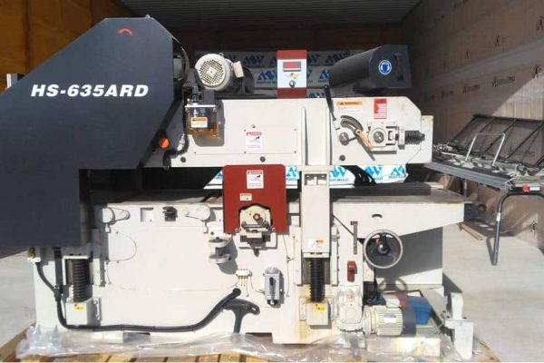 Heavy industrial paper cutting machine HS-635ARD with digital controls and safety features.