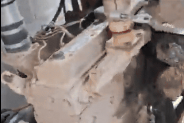 Close-up of a Cummins B3.3 diesel engine with visible fuel filter and engine block.