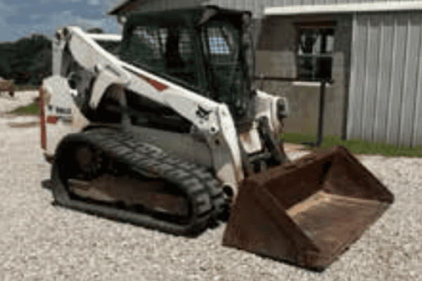 2018 Bobcat T650 compact track loader with bucket attachment on gravel surface.