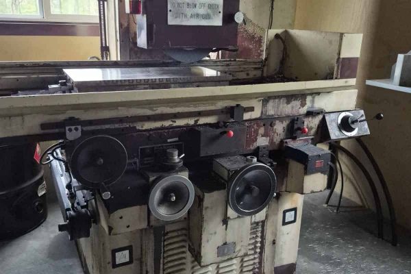 FSG-1224AD industrial milling machine with digital control panel, used for precision metalworking and machining tasks.