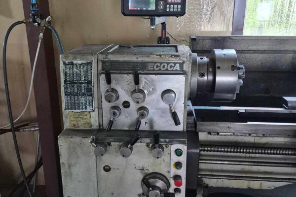 Ecoca metal lathe machine with digital control panel, used for precision machining.